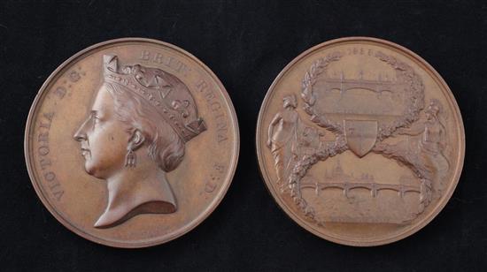 A pair of scarce bronze medals by G. G. Adams, 1869, commemorating the opening of Blackfriars Bridge and Holborn Viaduct, diameter 76mm